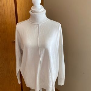 Beautiful Hi low turtleneck.